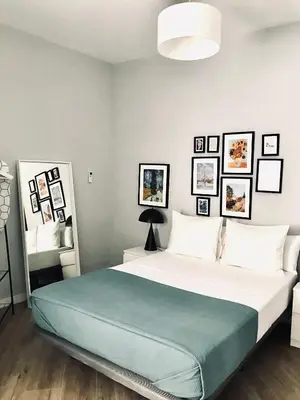 Cama o camas de una habitación en Apartamentos Élite - Art Collection - Vincent