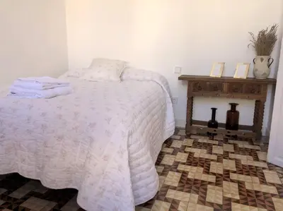Cama o camas de una habitación en Tu alojamiento en Cáceres