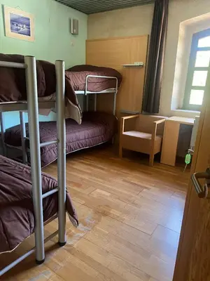 Cama o camas de una habitación en Albergue & Cafetería Vía de la Plata Hervás