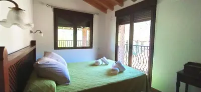Cama o camas de una habitación en La Almazara Del Guijo