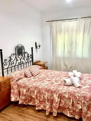 Cama o camas de una habitación en La Almazara Del Guijo