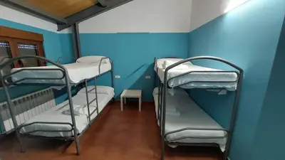 Cama o camas de una habitación en Albergue Villa de Salvatierra