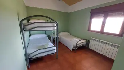 Cama o camas de una habitación en Albergue Villa de Salvatierra