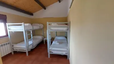 Cama o camas de una habitación en Albergue Villa de Salvatierra