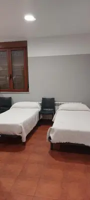 Cama o camas de una habitación en Albergue Villa de Salvatierra