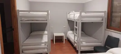 Cama o camas de una habitación en Albergue Villa de Salvatierra