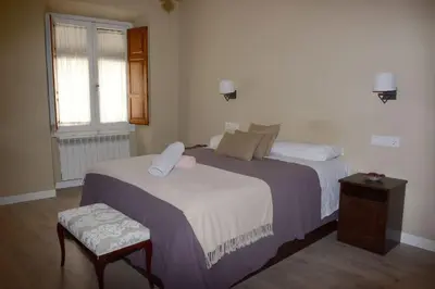 Cama o camas de una habitación en Fantástico Apartamento Casa Macarena Plaza Mayor