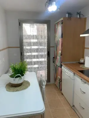 Una cocina o zona de cocina en lico
