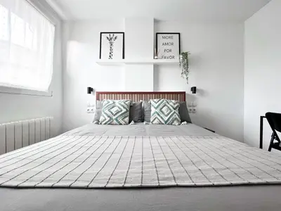 Cama o camas de una habitación en Duplex Ávila