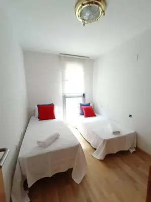 Cama o camas de una habitación en Alojamiento centro Cáceres Cánovas