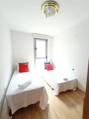 Cama o camas de una habitación en Alojamiento centro Cáceres Cánovas