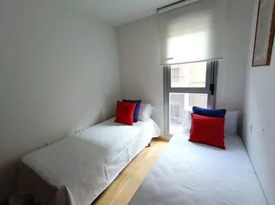 Cama o camas de una habitación en Alojamiento centro Cáceres Cánovas