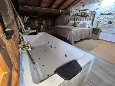 Cama o camas de una habitación en Casa rural La calleja de las hurdes TRCC00555