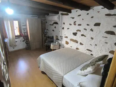 Cama o camas de una habitación en Casa rural La calleja de las hurdes TRCC00555