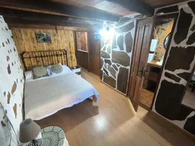 Cama o camas de una habitación en Casa rural La calleja de las hurdes TRCC00555