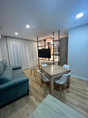 Zona de estar de M & A apartamentos turísticos