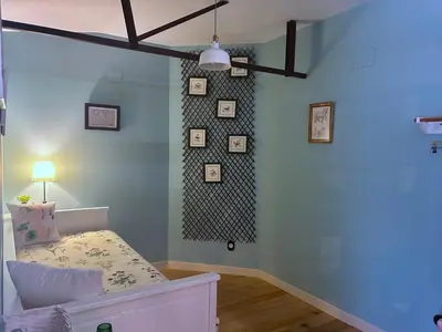 Cama o camas de una habitación en Casa Rural de La Vega