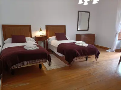 Cama o camas de una habitación en El Refugio de Villamiel