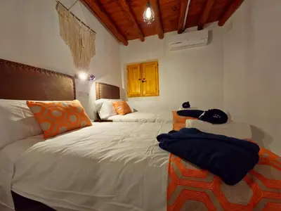 Cama o camas de una habitación en Apartamentos Rurales Tinguatón
