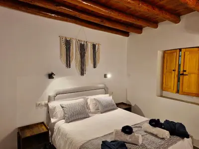 Cama o camas de una habitación en Apartamentos Rurales Tinguatón