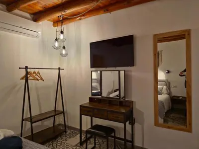 Cama o camas de una habitación en Apartamentos Rurales Tinguatón