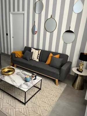 Zona de estar de Apartamentos La Chimenea