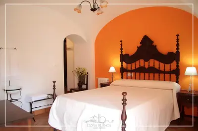 Cama o camas de una habitación en Casa Rural Doña Blanca