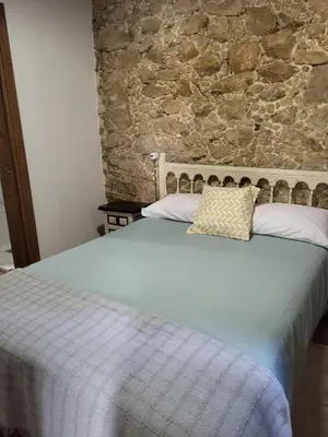 Cama o camas de una habitación en La Casa El Cura