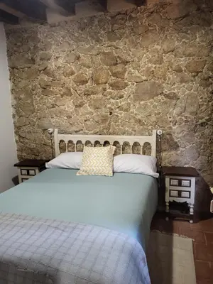 Cama o camas de una habitación en La Casa El Cura