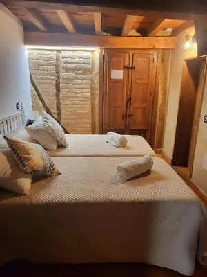 Cama o camas de una habitación en La Casa El Cura