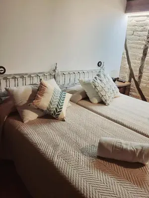 Cama o camas de una habitación en La Casa El Cura