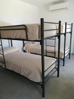Cama o camas de una habitación en Hostel Divino Morales
