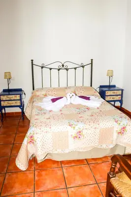 Cama o camas de una habitación en El Patio de los Naranjos