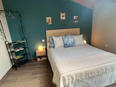 Cama o camas de una habitación en Grupo García de Paredes apartamentos turísticos