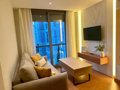 Una televisión o centro de entretenimiento en Apartamento Punto24