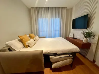 Una televisión o centro de entretenimiento en Apartamento Punto24