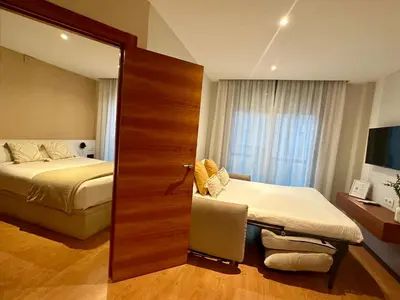 Cama o camas de una habitación en Apartamento Punto24