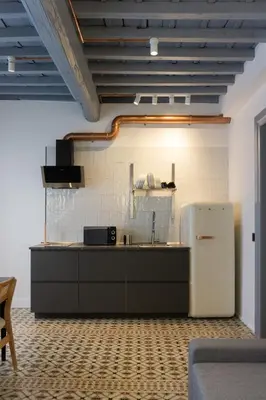 Una cocina o zona de cocina en La Antigua Farmacia