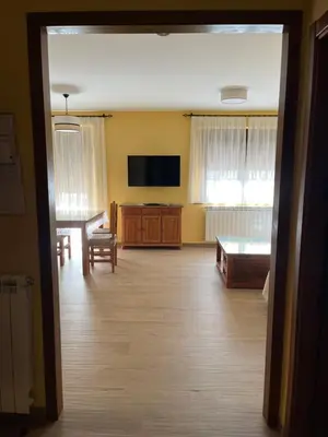 Una televisión o centro de entretenimiento en Casa Rural De Mascoras