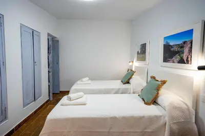 Cama o camas de una habitación en APARTAMENTO BERROCALA