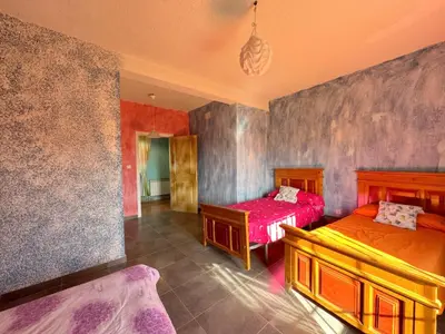 Cama o camas de una habitación en La Canaleja