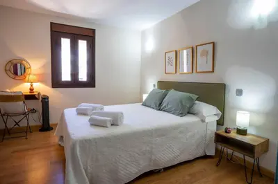 Cama o camas de una habitación en Dúplex apartamento Godoy Centro by keyhom