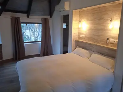 Cama o camas de una habitación en Casa Rural Crisol Spa