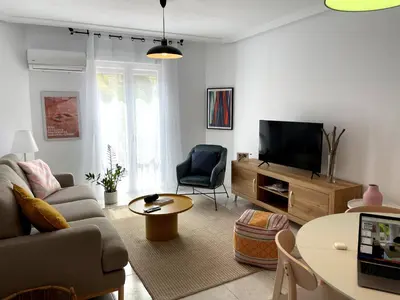 Una televisión o centro de entretenimiento en Apartamento La Peatonal