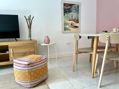 Una televisión o centro de entretenimiento en Apartamento La Peatonal