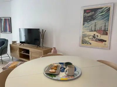 Una televisión o centro de entretenimiento en Apartamento La Peatonal