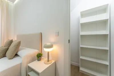 Cama o camas de una habitación en Casa Augusto - junto al Teatro Romano, con garaje
