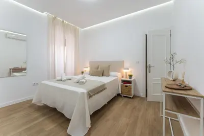 Cama o camas de una habitación en Casa Augusto - junto al Teatro Romano, con garaje