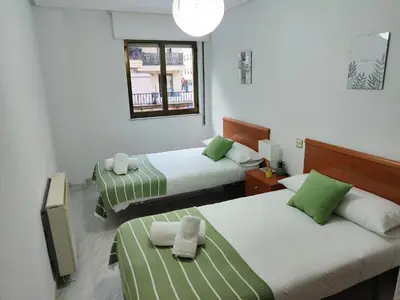 Cama o camas de una habitación en Exclusiva vivienda en el centro de Salamanca