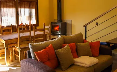 Zona de estar de Apartamentos Rurales El Calama